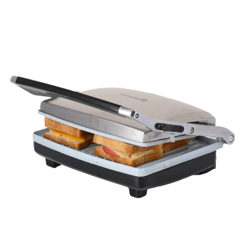Sandwich maker with two sandwiches being made on a white background